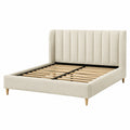 Lit double Xernavik 160x200 cm en tissu beige avec sommier à lattes, style contemporain, visible avec coussins et décoration.