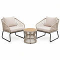Salon de jardin Xernavik avec 2 fauteuils en fibres tressées beige et table ronde, style contemporain, 75 cm.